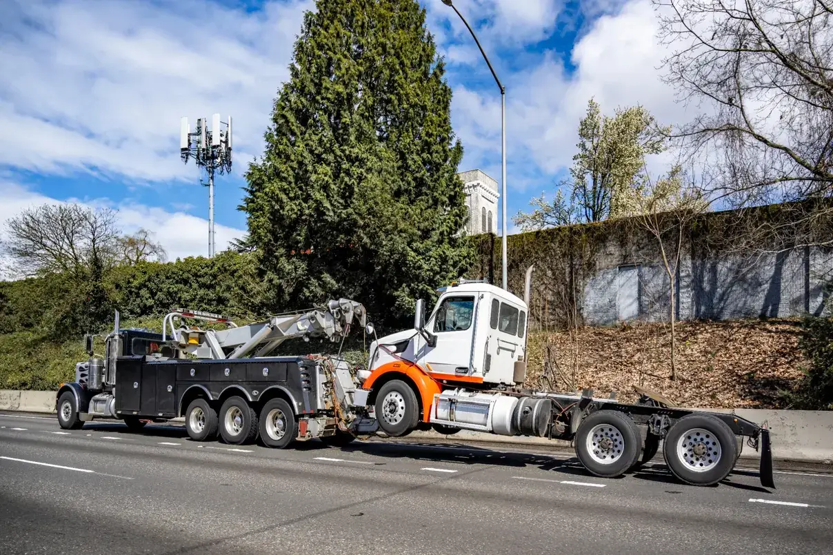 Heavy duty diesel tow truck demonstrating the power and capability of Class 8 commercial vehicles
