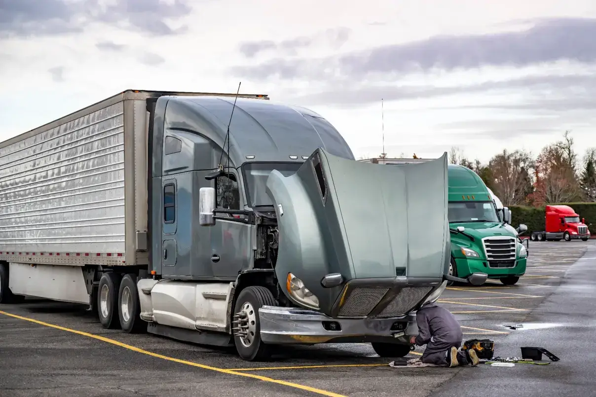 Commercial truck at a truck stop repair facility receiving service