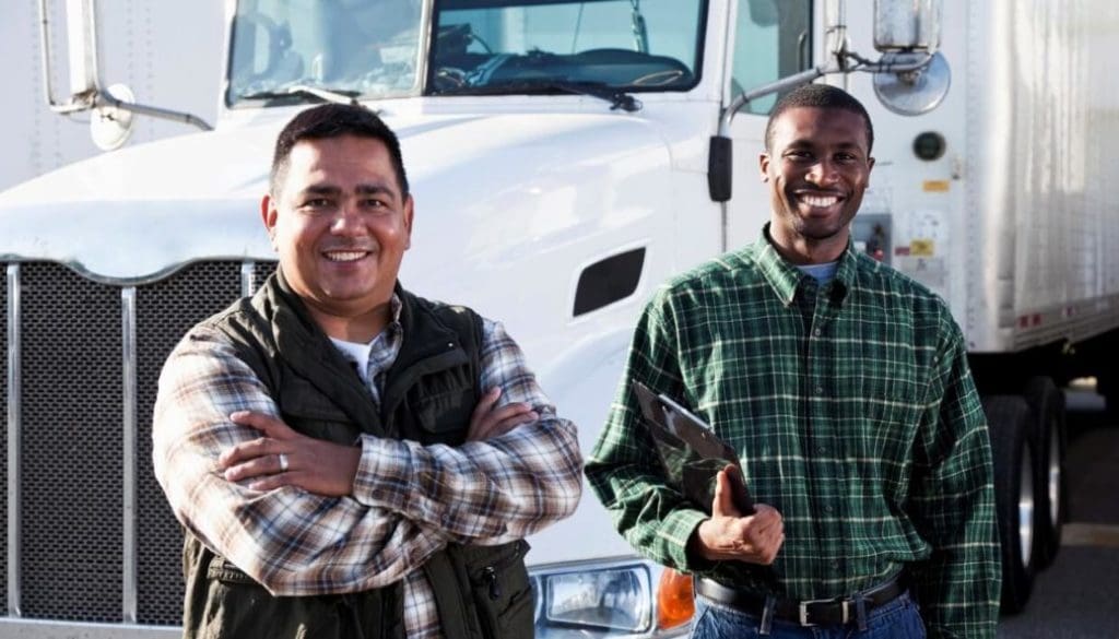 Trucking company team reviewing driver applications through TruckDriver.com's fleet recruiting platform